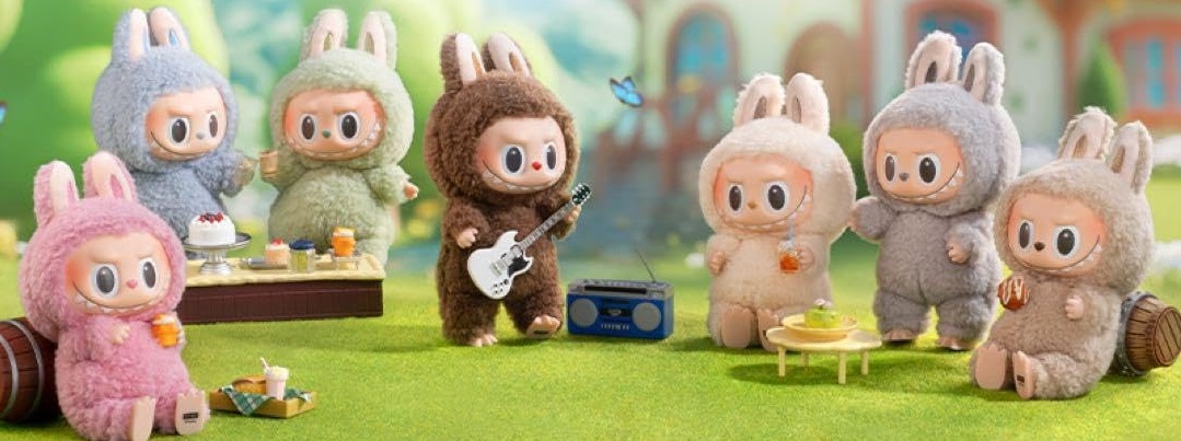 A promotional banner for the Labubu Exciting Macaron series, showing the characters enjoying a picnic.